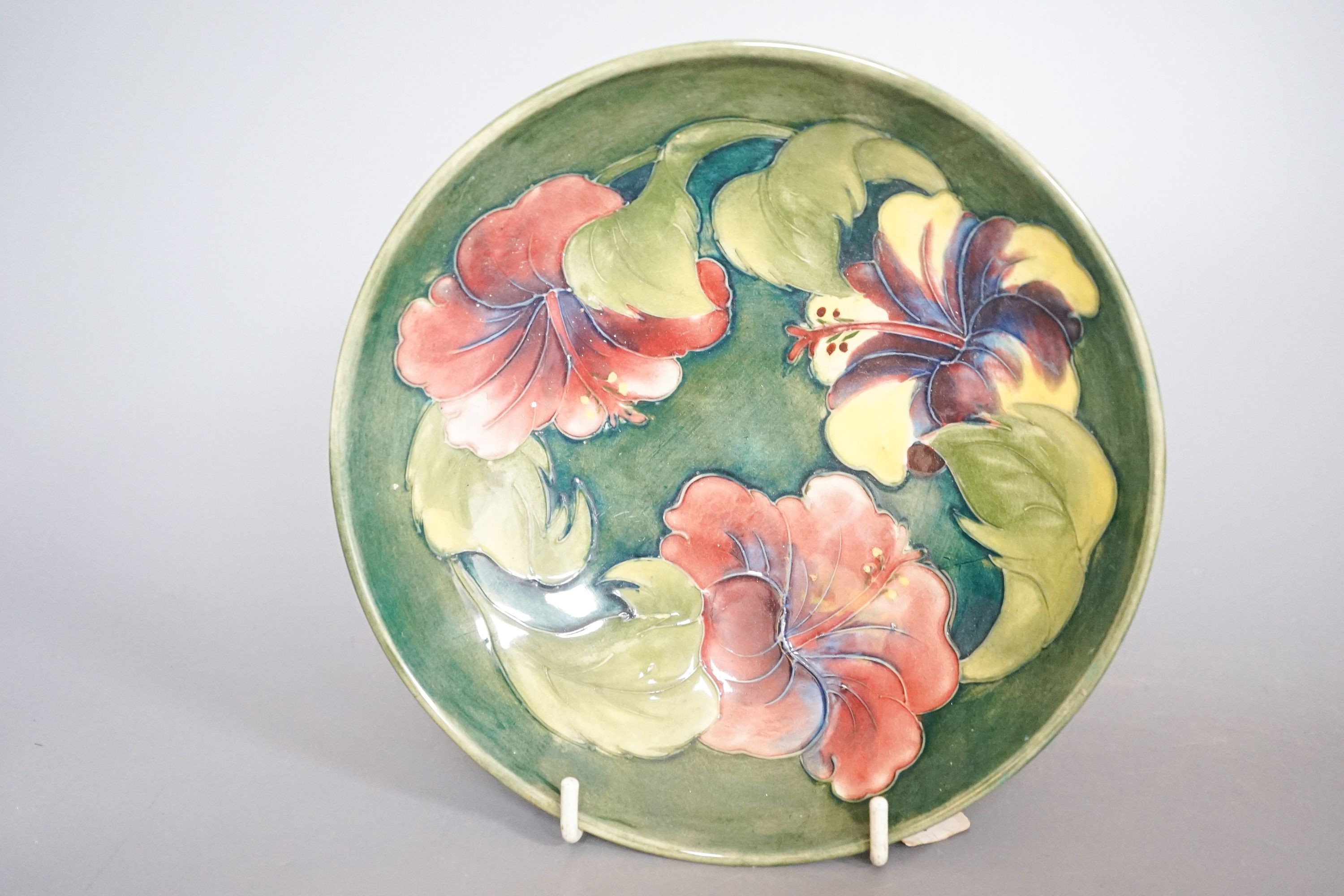 A Moorcroft hibiscus pattern vase, bowl and plant pot 19cm